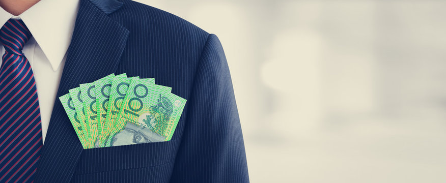 Money,Australian dollar (AUD) banknotes, in businessman suit pocket