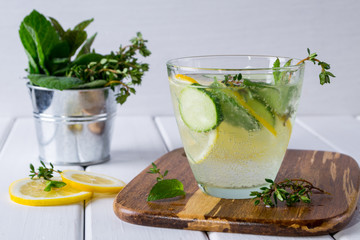 Refreshing  cucumber  cocktail, lemonade, detox water  in a glasses on a white background. Summer drink.