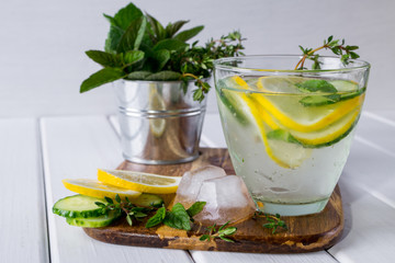 Refreshing  cucumber  cocktail, lemonade, detox water  in a glasses on a white background. Summer drink.