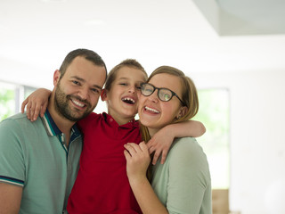 Naklejka premium family with little boy enjoys in the modern living room