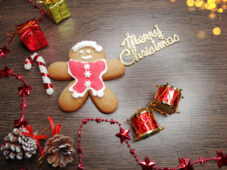 christmas cookies gingerbread and decoration on wooden background