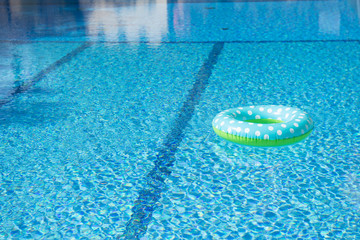 Fototapeta na wymiar Floating toy in swimming pool