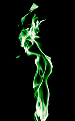 Green flame of fire on a black background