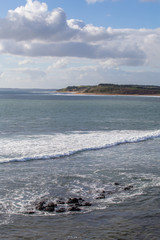 Calm ocean view with land in the background on Phillip Island Australia