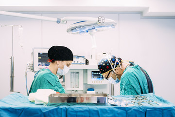 Team of Surgeons Operating in the Hospital.