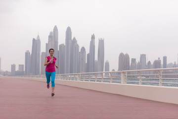 woman running on the promenade