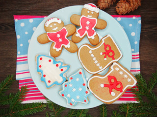 christmas cookies gingerbread and decoration on wooden background