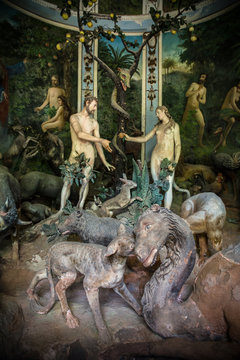 Sacro Monte di Varallo, Piedmont, Italy, June 02 2017 - biblical characters scene representation of Adam and Eve in the Eden
