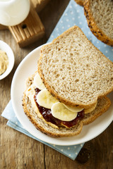 Peanut butter and jelly sandwich with banana