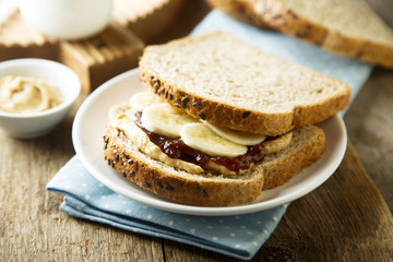 Peanut butter and jelly sandwich with banana