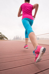 woman running on the promenade