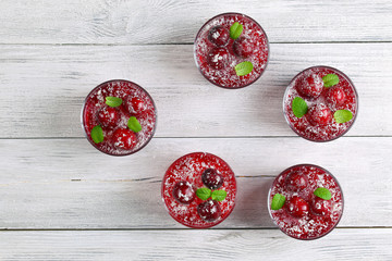 cherry jelly in glasses on table