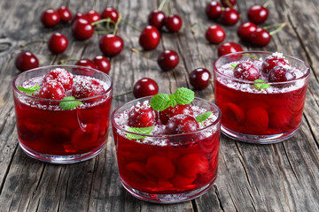 sweet cherry jelly in three glass cups