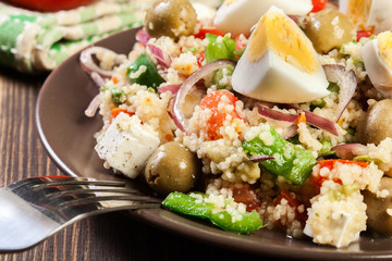 Fresh salad with couscous and eggs