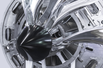 Turbine Engine. Aviation Technologies. Aircraft jet engine detail in the exposition. Blue toned.