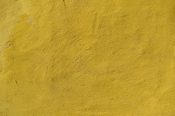 yellow concrete background texture with scraps
