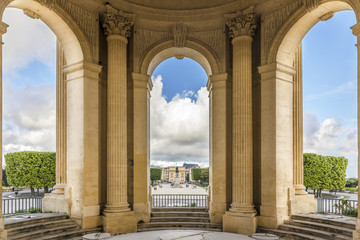 Fototapeta premium View through main basin monument arcs on Peyrou park with statue at Montpellier southern France