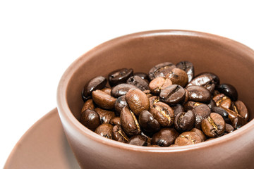 Brown Coffee Beans And Coffee Cup