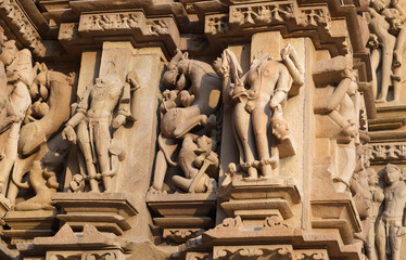 Ancient stone figure at famous Hindu temple in Khajuraho, India