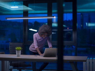 black businesswoman using a laptop in startup office