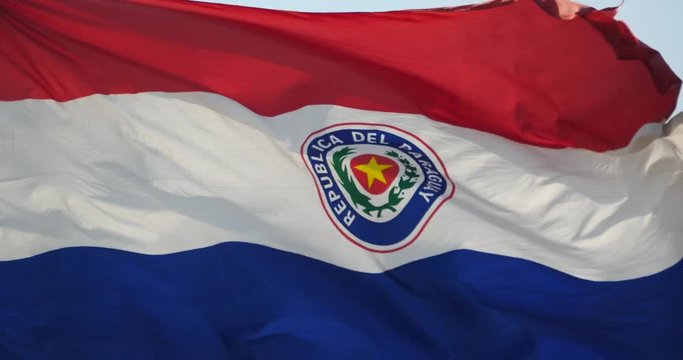 4k Paraguay flag is fluttering in wind.