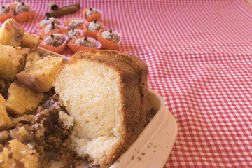 Brazilian dessert peanuts cake on a wood table. Festa Junina Party Brazilian Culture Concept Image.