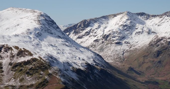 Winter views of snow covered mountains in the Eastern Fells of the English Lake District. Summits of St Sunday Crag, The Cape, Dollywaggon and Nethermost Pike.