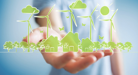 Businessman holding renewable energy sketch