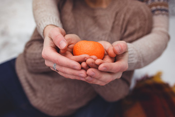 Orange in the hands