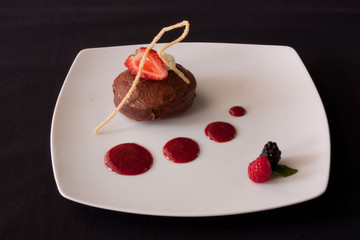 chocolat cake dessert with redfruits sauce