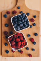 Blueberries and raspberries, healthy forest berry fruit