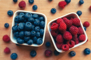 Blueberries and raspberries, healthy forest berry fruit