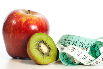 Red apple fitnes concept with centimeter.