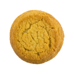 Top view of a sugar cookie with hazelnut filling isolated on a white background.