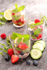 water and fruits with ice cube