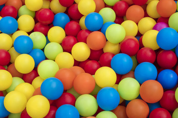 Fototapeta na wymiar Detail of many colorful plastic balls