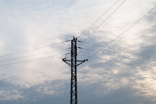 Electric pole with sky background