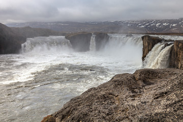 The Godafoss Waterfall - beautiful part of stony rocky desert landscape of Iceland