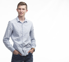 Young happy man portrait of a confident businessman on a gray background. Ideal for banners, registration forms, presentation, landings, presenting concept.