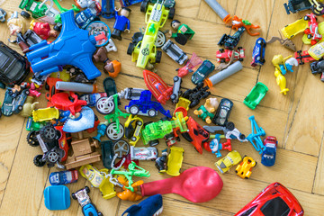 Close up of a pile of small toys.