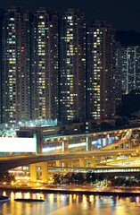 Night shot of a city skyline.