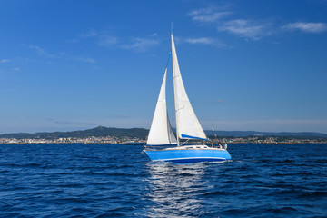 Fototapeta na wymiar view of sailing yacht in the ocean