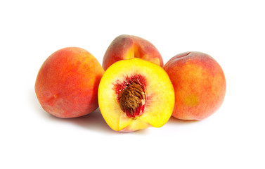 Fresh peach fruits isolated on white background