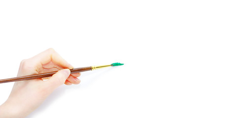 Isolated photo of a brush in a hand