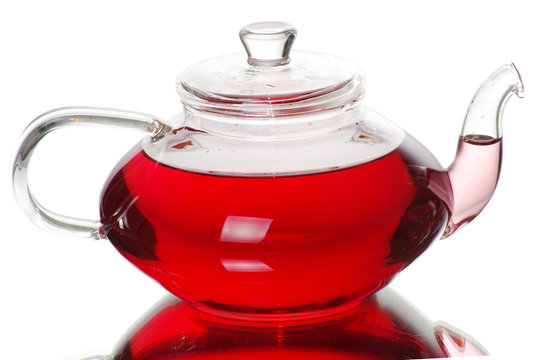 Tea being poured into glass tea cup