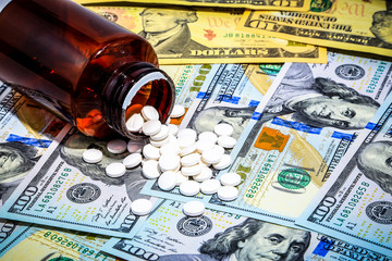Health care cost concept with Drugs and one hundred dollars background, Adjust tone color.