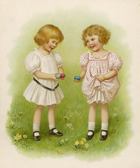 Two little girls with Easter eggs. Date: circa 1890