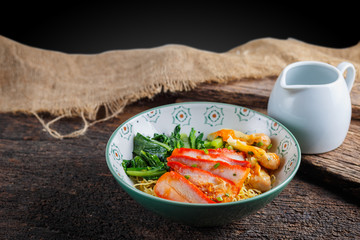 Chinese food : noodle dumpling with parsley and roasted red pork