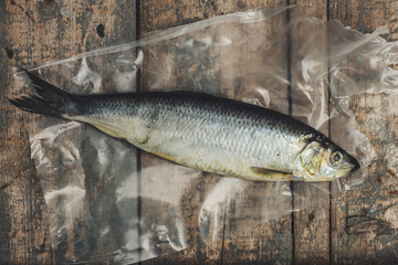 Herring on a wooden surface