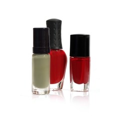 Nail polishes bottles isolated on white